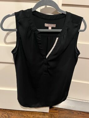Black sleeveless blouse
